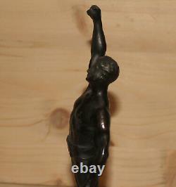 Antique hand made metal man athlete figurine