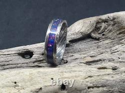 Damascus deep space opal glow ring. Damascus stainless steel opal inlay wedding
