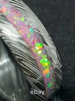 Damascus stainless steel wedding glow ring with hot pink opal inlay