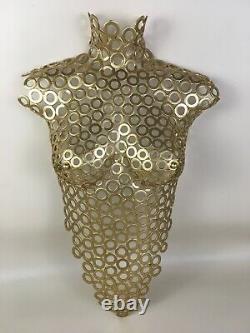 Handcrafted female torso wall art. Steel washers painted GOLD