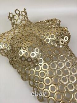 Handcrafted female torso wall art. Steel washers painted GOLD