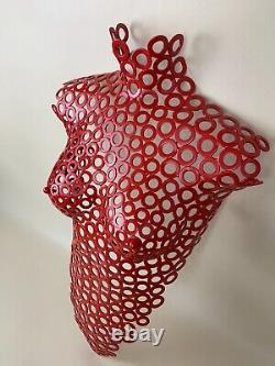 Handcrafted female torso wall art. Steel washers painted PILLAR BOX RED