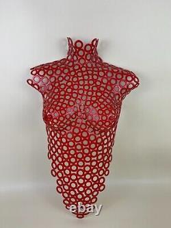 Handcrafted female torso wall art. Steel washers painted PILLAR BOX RED