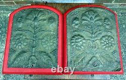 Pair Newton School of metalwork Arts & Crafts oak leather repousse brass plaques