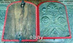 Pair Newton School of metalwork Arts & Crafts oak leather repousse brass plaques